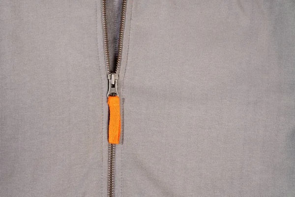 Orange zipper on sweatshirt design and fashion concept — Stock Photo, Image