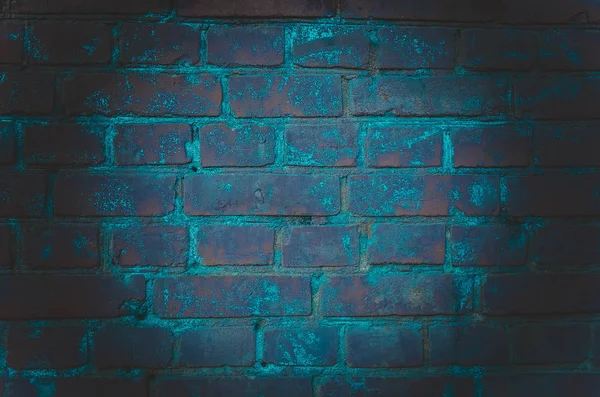 The background of an empty room with brick walls and concrete floor tiles. Neon light, spotlight — Stock Photo, Image