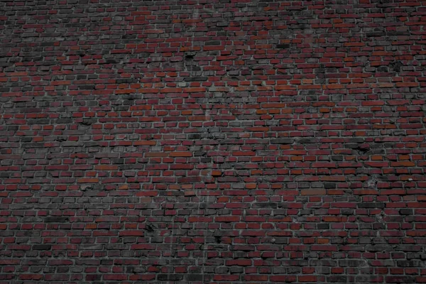 Pared fuerte hecha de ladrillos cocidos — Foto de Stock