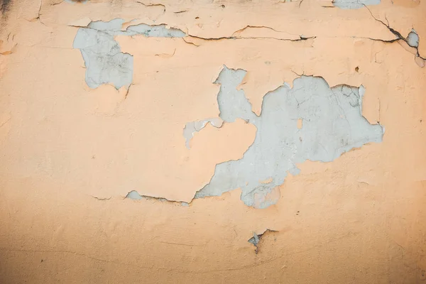 벗겨낸 페인트 베이 지 벽의 배경 — 스톡 사진