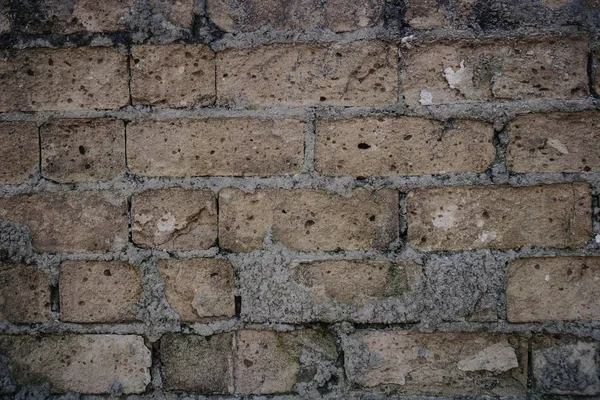 Vecchio muro di mattoni e mattoni mancanti in rovina . — Foto Stock