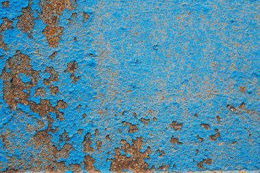 Eski Boyalı Mavi Duvar. Arka plan. Çatlak Flaked Shabby Duvar Rundown Sıva Tabakası Doku ile.