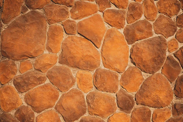 Una pared de rojo, ni siquiera piedra, en forma de pera —  Fotos de Stock