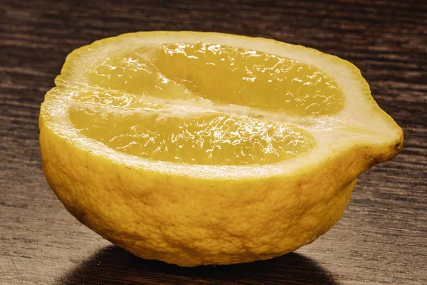 yellow, fresh lemon. lemon slices on wooden background