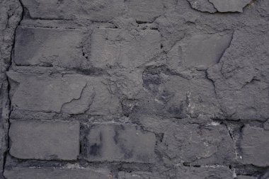 Eski siyah duvar. Tuğla arka plan. Grunge.