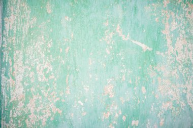 kırık yeşil duvar boya boyalı. eski duvar dokusu