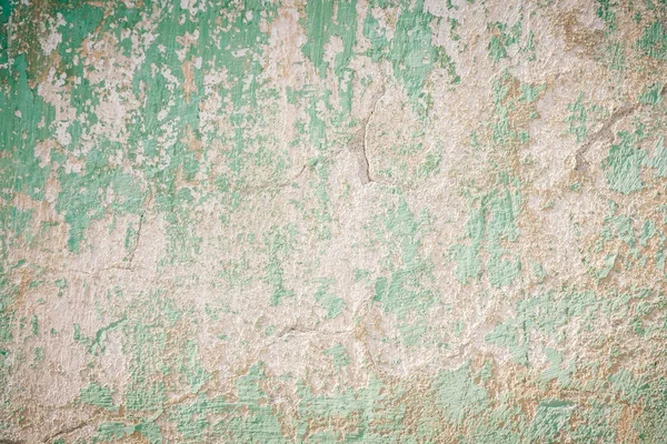 Painted green wall cracked paint. The texture of old wall — Stock Photo, Image