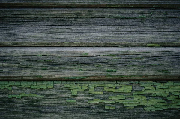 Struttura in legno verde come sfondo vecchio recinto collassante — Foto Stock