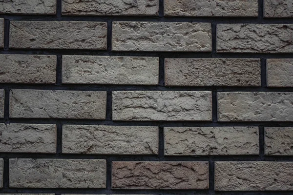 Vit vägg av tegel med en grå nyans tegel bakgrund — Stockfoto