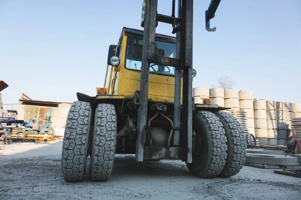 big spiked wheels of yellow tractor durable rubber tires