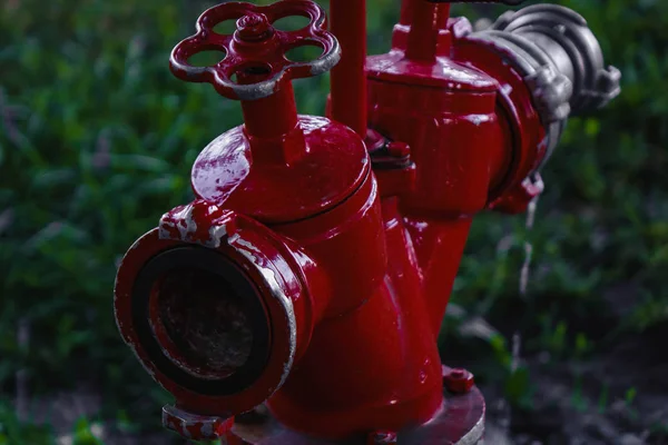 Red fire hydrant on the street. Fire hydrant