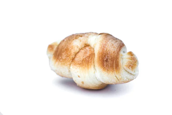 Piccolo croissant succoso isolato su sfondo bianco . — Foto Stock
