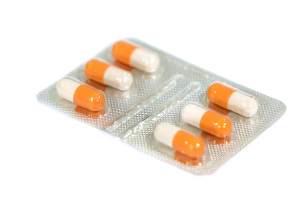 Envases de cápsulas médicas sobre fondo blanco —  Fotos de Stock