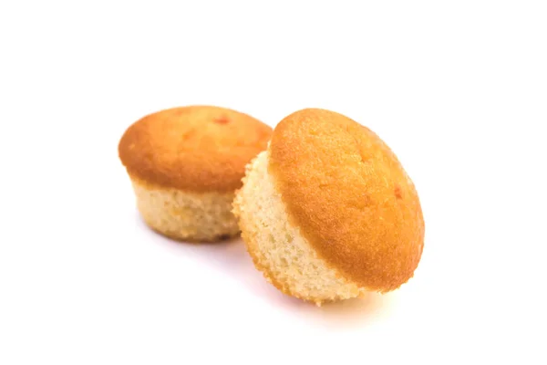 Dwa żółte Cupcakes na białym tle — Zdjęcie stockowe