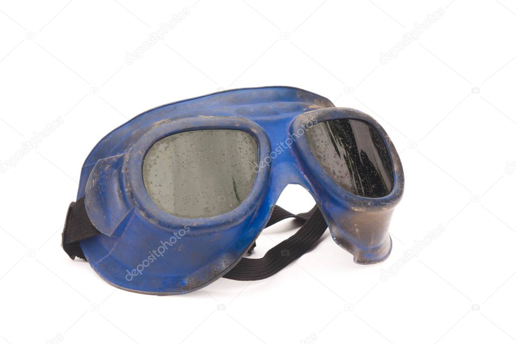 old welding goggles blue color isolated on white background