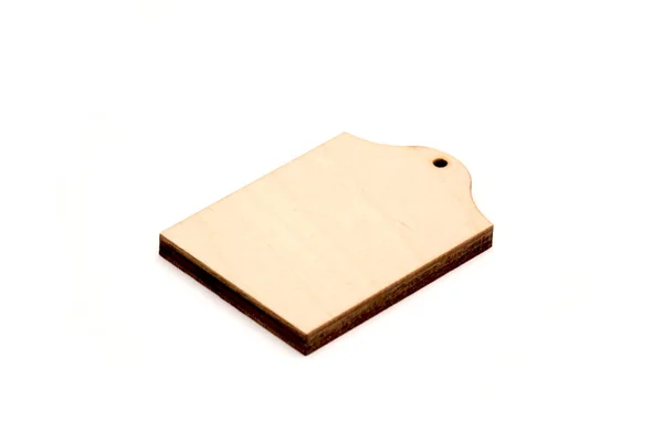 Insignia de madera limpia aislada sobre fondo blanco — Foto de Stock