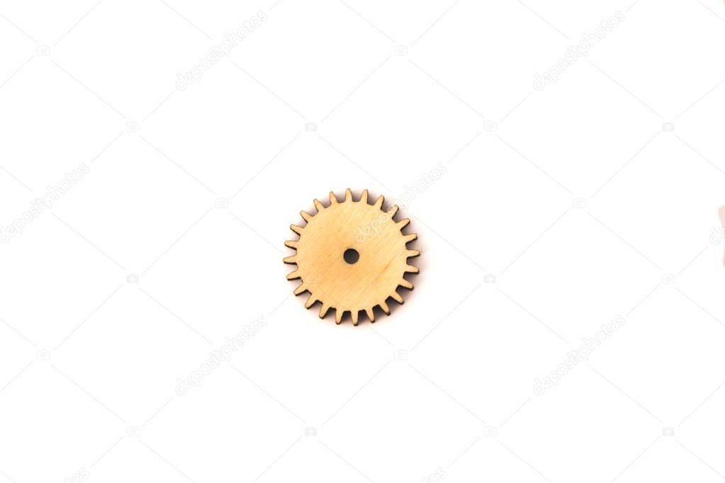 one wooden gear isolated on white background
