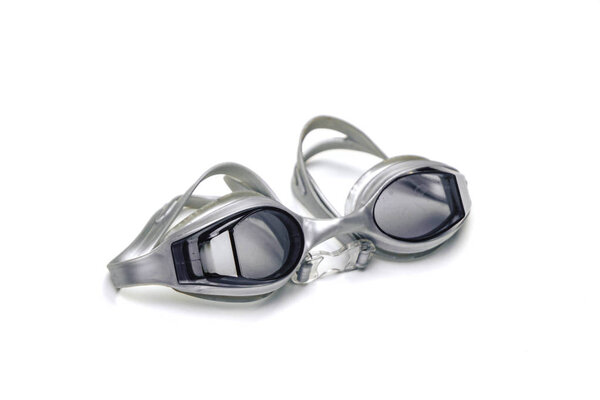 Swimming goggles, with blue glasses on isolated white background.