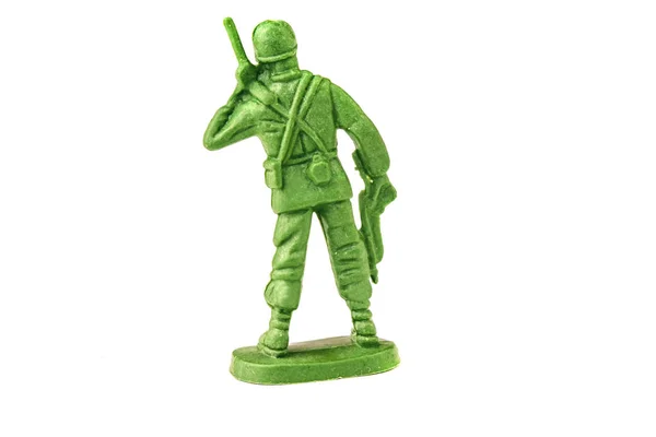 Soldado de juguete en miniatura sobre fondo blanco, primer plano — Foto de Stock