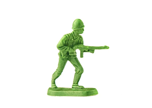 Soldado de juguete en miniatura sobre fondo blanco, primer plano — Foto de Stock