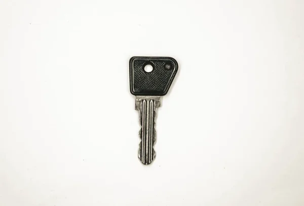 New black key isolated on white background — Stock Photo, Image