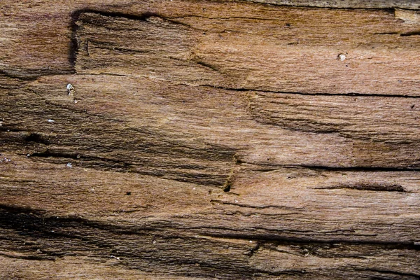 Un vecchio sfondo di legno marrone con crepe — Foto Stock