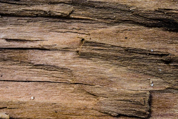 Un vecchio sfondo di legno marrone con crepe — Foto Stock