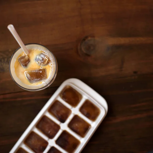 Frozen Coffee Cubes Milk Cocktails Dark Wooden Table Top View — Stock Photo, Image