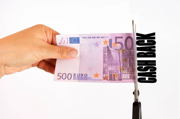 Concept of cash back. The scissors cut banknote 500 euros inscription cash back.