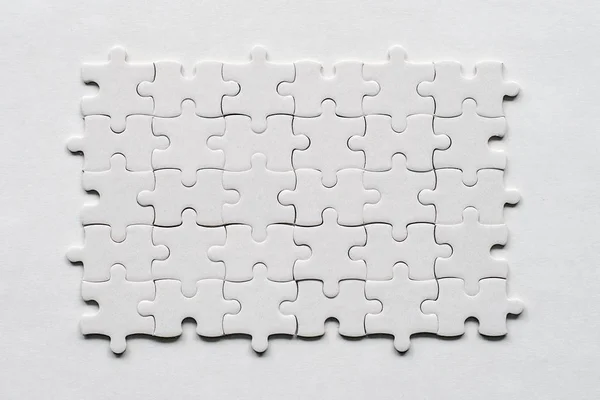 White Jigsaw Puzzle White Bacground — Stock Photo, Image