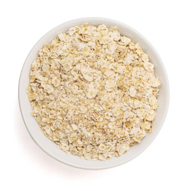 Beyaz arka planda izole edilmiş kuru yulaf ezmesi. Üst görünüm