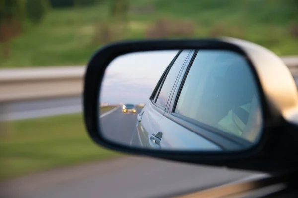 reflection in a car mirror background