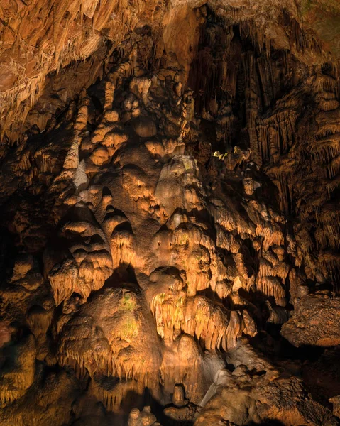 Beautiful cave formations with stalagmites and stalactites deep under ground