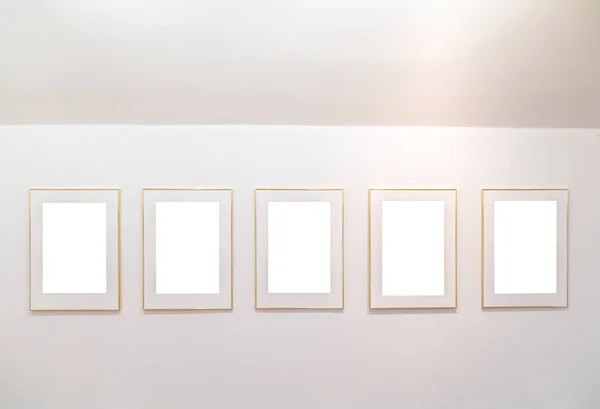 Empty Frames on the wall in modern art museum Gallery Exhibit Blank White Isolated Clipping Path
