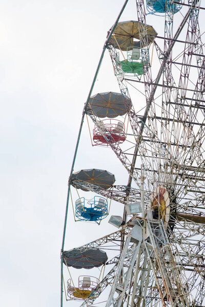 Vintage ferris wheel. Colourful old carousel at circus with copy space for text. 
