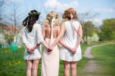 Back view of group of bridesmaids with bride-to-be in beautiful