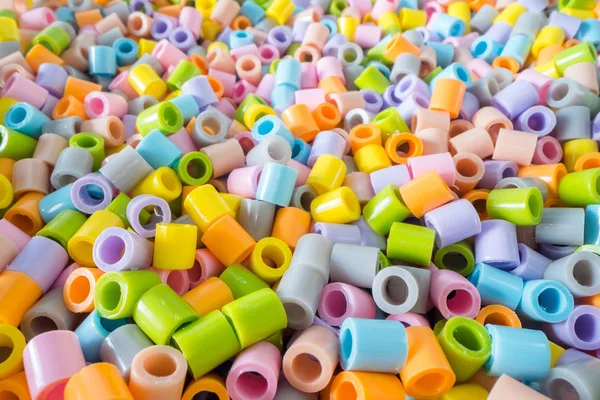 Short plastic tube pieces stacked on top of each other. Plastic waste and recycling concept — Stock Photo, Image