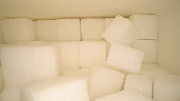 Macro Dolly Tiro Deslizar Através Cubos Açúcar Lado Caixa Papelão — Vídeo de Stock