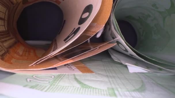 Dolly Shot Euro Bank Notes Rolled Tubes Gliding Euro Money — Stock Video