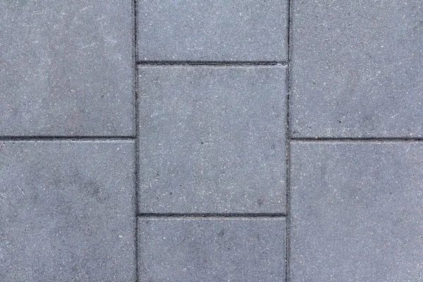 Concrete tile texture. City pavement background. Abstract stone brick pattern. Street sidewalk texture.