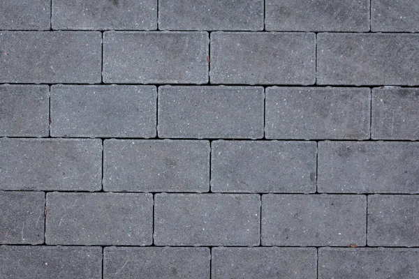 Конкретная текстура плитки. Городской тротуар. Абстрактный кирпичный рисунок. Уличная текстура . — стоковое фото