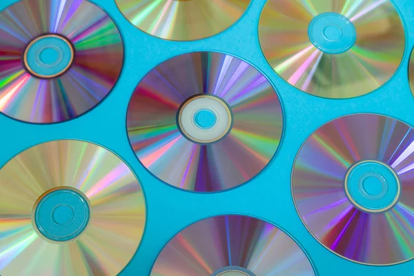 Vintage CD o DVD de fondo de disco, viejos discos de círculo utilizados para el almacenamiento de datos, compartir películas y música —  Fotos de Stock