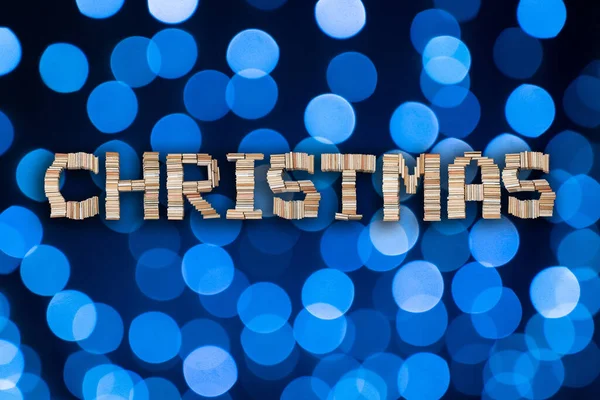 Jultext Abstrakt Blå Bokeh Bollar Bakgrund Semesterbrev Festlig Bakgrund — Stockfoto
