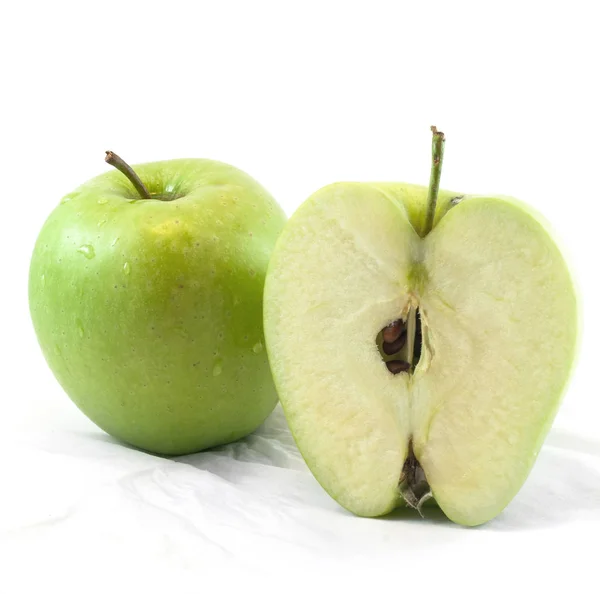 Fresh cut green apple on white background