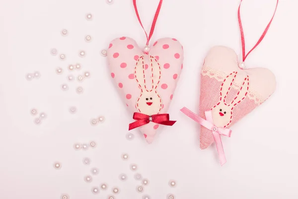 romantic heart with hare, pearl and bows for a greeting card