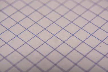 Kafesteki bulanık defterle makro çekim.