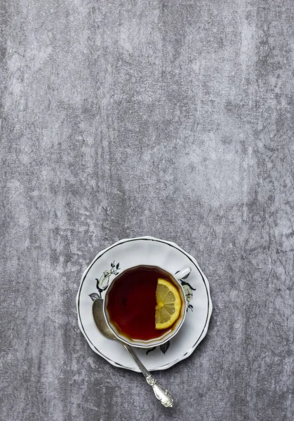 Tea Lemon Teacup Saucer Spoon Gray Background — Stock Photo, Image