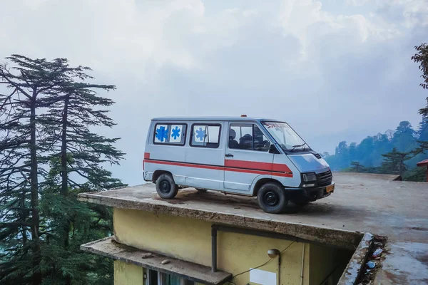 Parked ambulance car on the roof of the building. Shimla, India