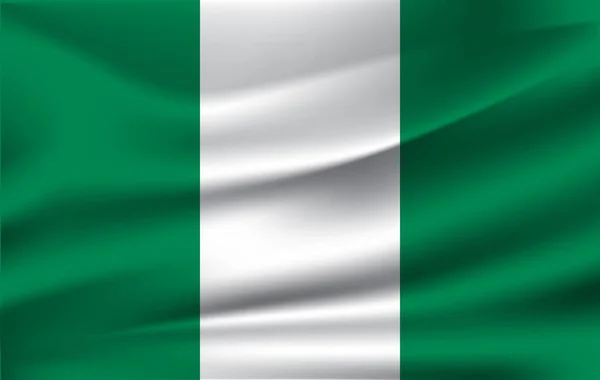 나이지리아의 국기입니다. 실제 나이지리아 연방 공화국의 국기를 흔들며. — 스톡 사진