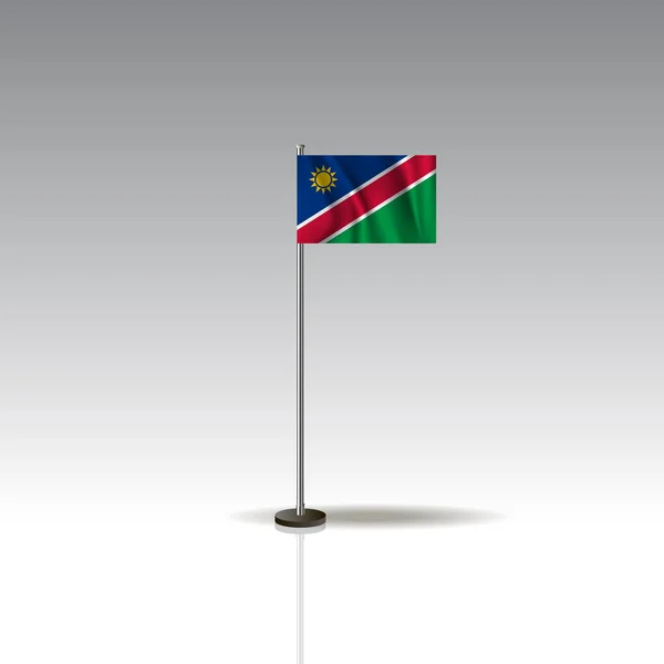 Illustratie van de vlag van het land van Namibië. Nationale vlag van Namibië geïsoleerd op een grijze achtergrond. — Stockvector